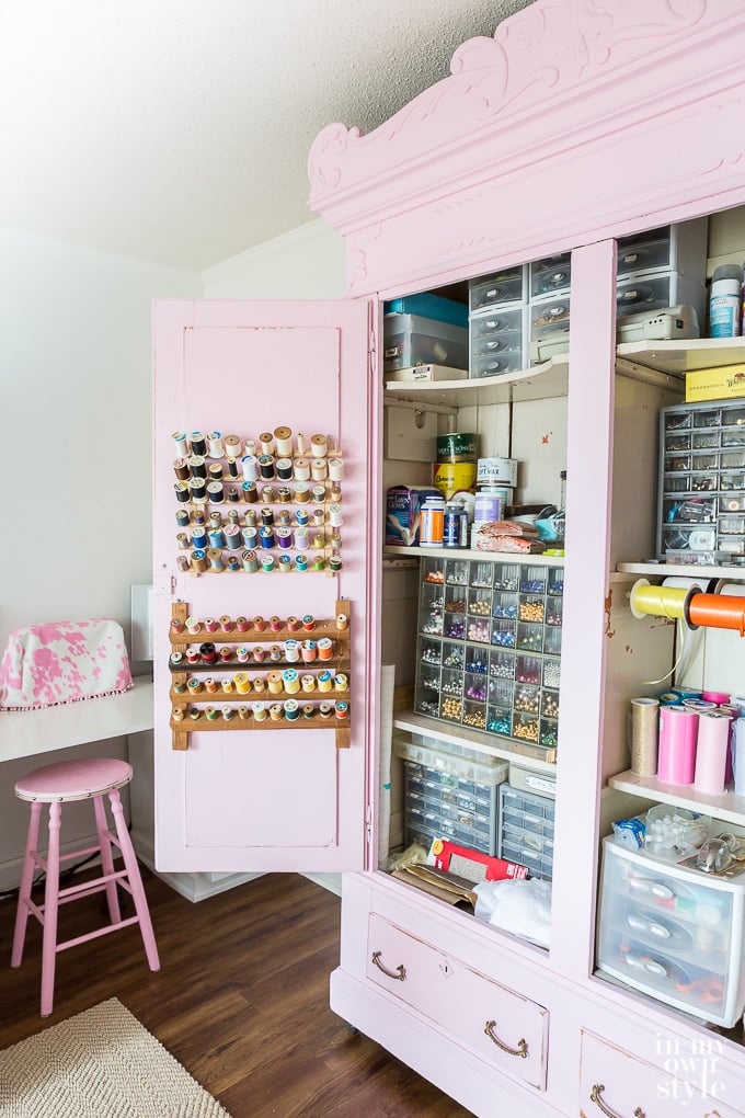 open large pink craft room cabinet