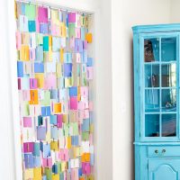 How to make a colorful curtain for a doorway using paint chips.