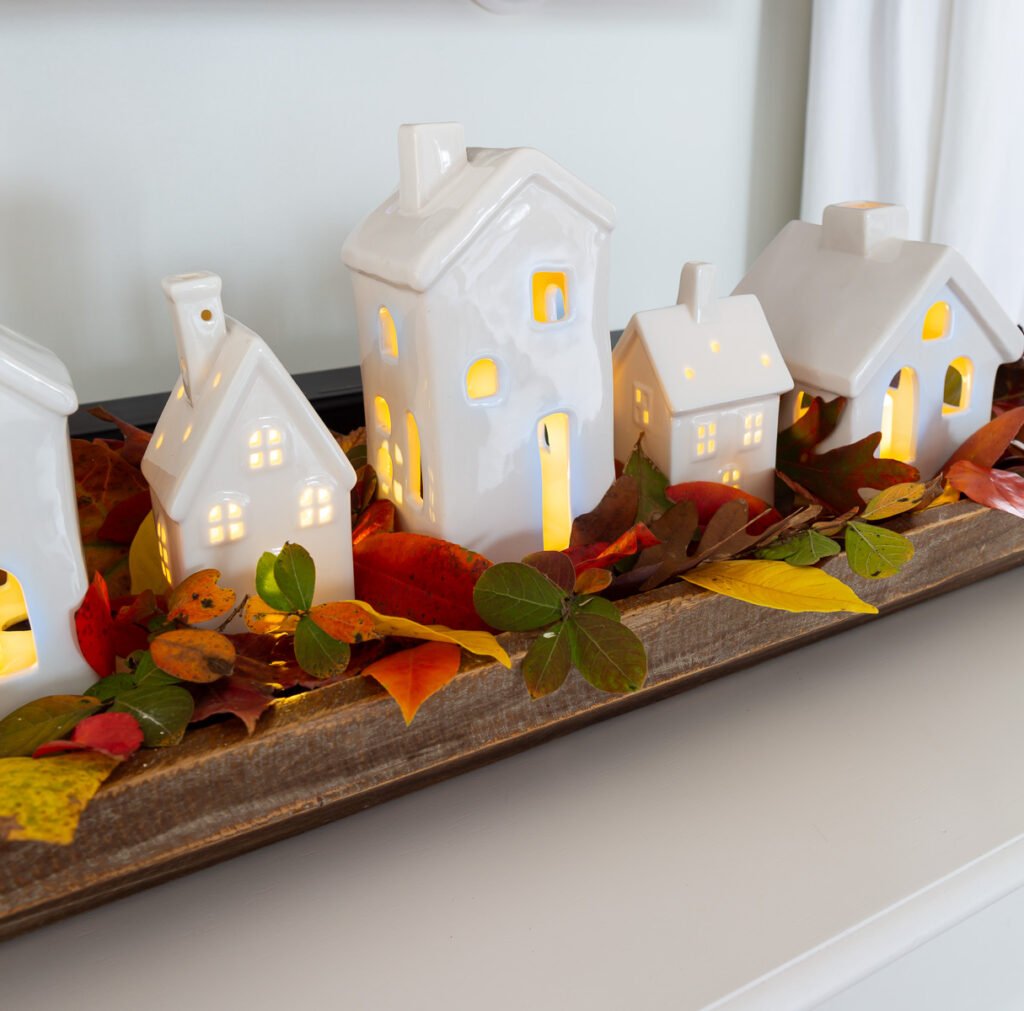 Light up ceramic village display ideas for a mantle or table for both fall and Christmas decor.