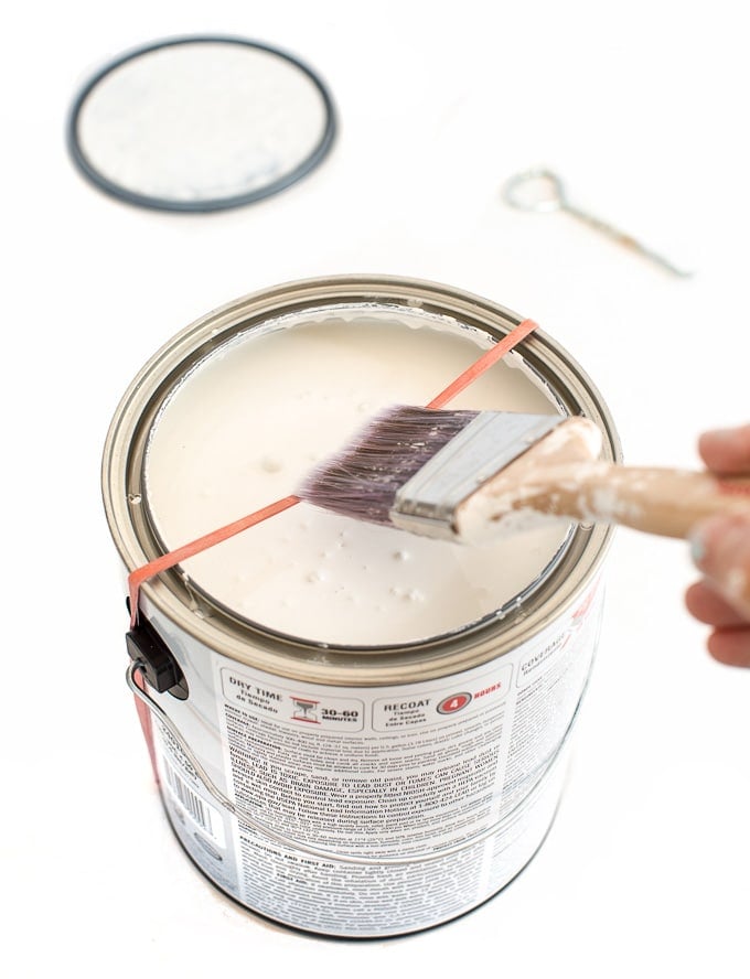 Paint clean up tips. How to dip a paint into a can of paint.