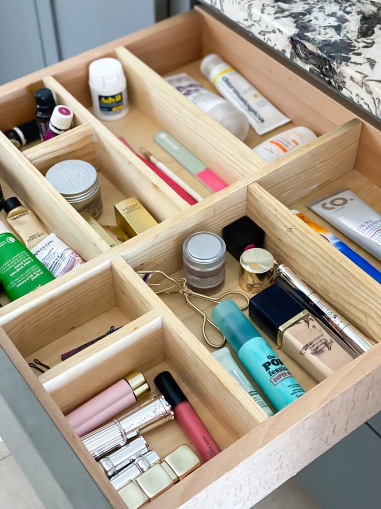 bathroom drawer with DIY wood dividers to keep items organized