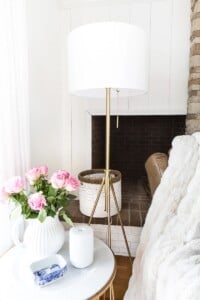 floor lamp and table in white room