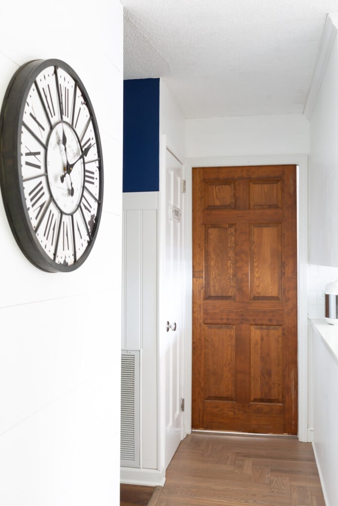 Closed pocket door in hallway.