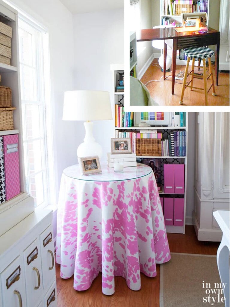 pink and white skirted round table in a craft room where a sewing machine is stored underneath the table.