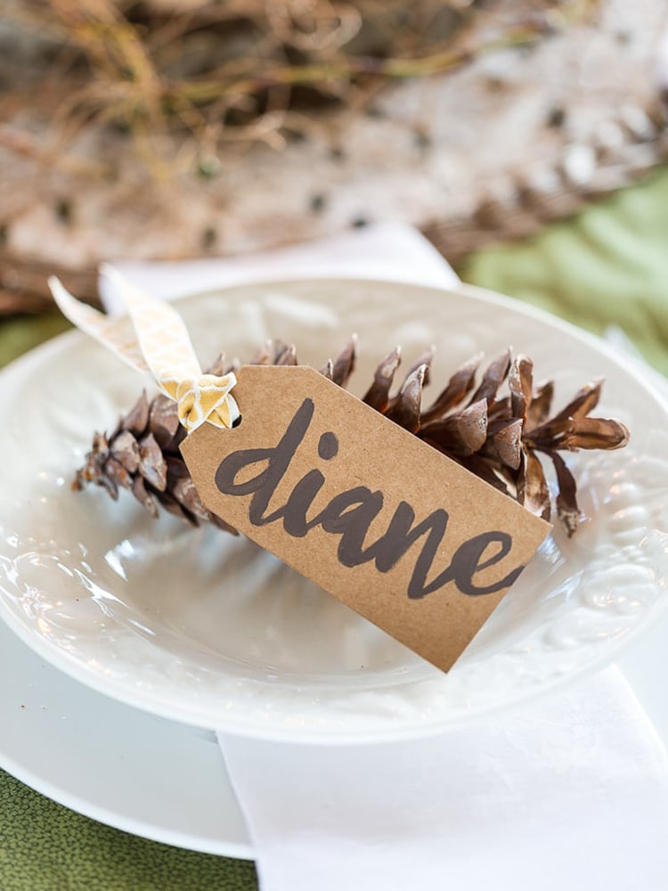 Brown Kraft paper place card on white plate for Thanksgiving table setting